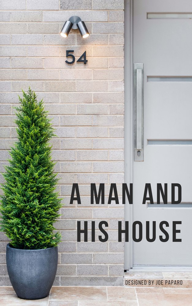 Cover of the book A Man and His House: a potted conifer beside a pale brick wall and front door