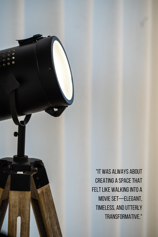 Book page: a black studio spotlight on a timber tripod